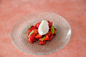 Strawberries with truffled vinegar and whipped cream